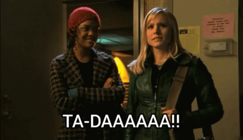 Two Women Standing Next To Each Other With The Words Ta-Daaaaa On The Bottom GIF
