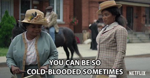 Two Women Standing Next To Each Other With The Words " You Can Be So Cold-Blooded Sometimes " Written On The Bottom GIF