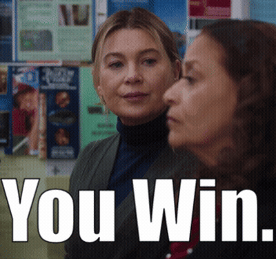 Two Women Standing Next To Each Other With The Words " You Win " On The Bottom Right GIF