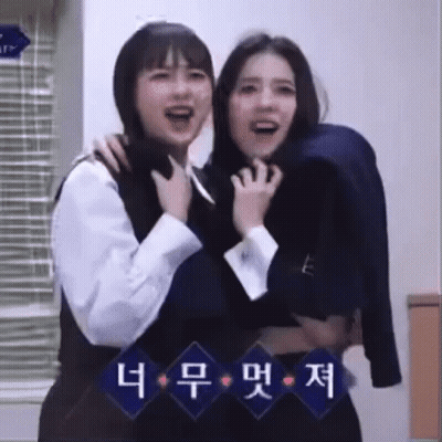 Two Women Standing One Carrying Other GIF