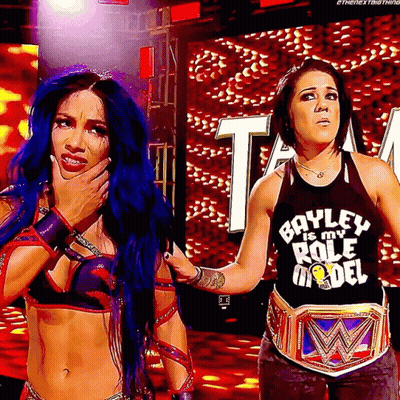 Two Women Standing, One Wearing Boyley Is My Role Model Shirt GIF