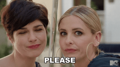 Two Women Standing Saying Please GIF
