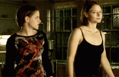 Two Women Standing Together GIF