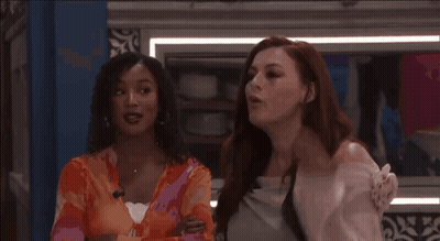 Two Women Standing Together GIF