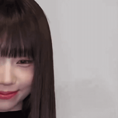 Two Women Standing With Eyes Closed GIF
