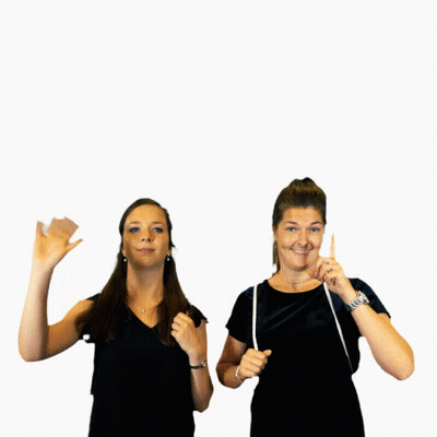 Two Women Standing With Measuring Tape GIF