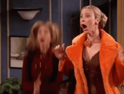 Two Women Standing With Mouths Open GIF