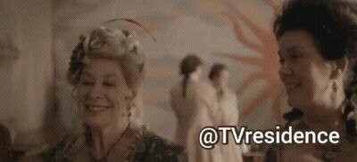 Two Women Standing With @Tvresidence Behind Them GIF
