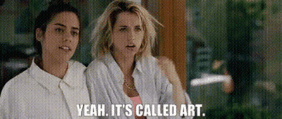 Two Women Talking About Art GIF