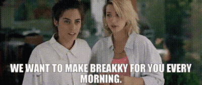 Two Women Talking About Art GIF