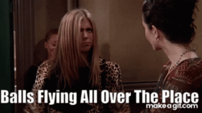 Two Women Talking Balls Flying All Over The Place GIF