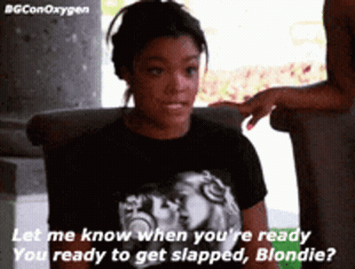 Two Women Talking Black Shirt Let Me Know GIF