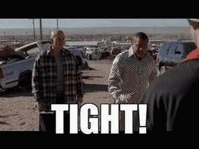 Two Women Talking In Bathroom With I Love You Tattoo GIF