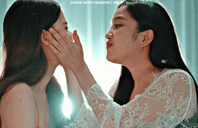 Two Women Touching Faces With Sunset And The Moon GIF