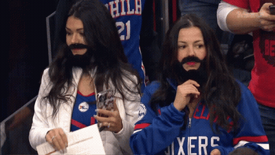 Two Women With Fake Beards At 76Ers Stadium GIF