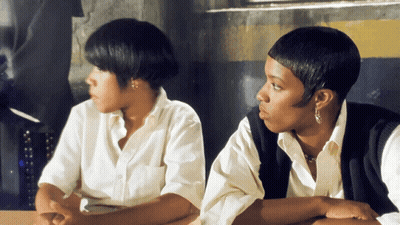 Two Women With Hands On Hips GIF