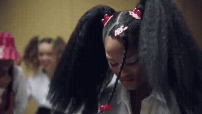 Two Women With Long Black Hair, One Ponytailed GIF