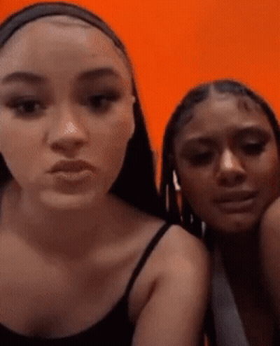 Two Women With Open Mouths GIF