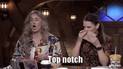Two Women With Open Mouths One Holding Napkin To Nose GIF