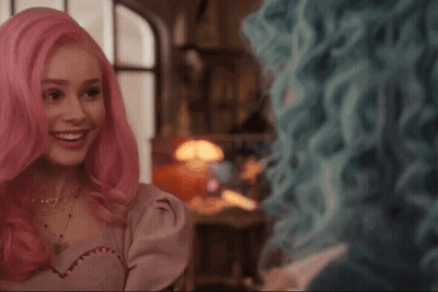 Two Women With Pink And Blue Hair Smiling GIF