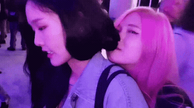 Two Women With Pink Hair Kissing GIF