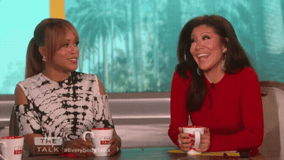 Two Women With Sign The Talk GIF