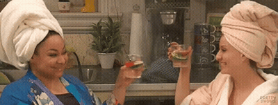 Two Women With Towel Turbans Toasting GIF