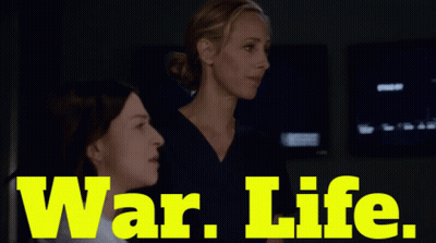 Two Women With War Life In Yellow GIF