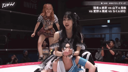 Two Women Wrestling In A Ring With Tjpw Written On The Bottom Right GIF
