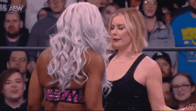 Two Women Wrestling In Front Of Crowd GIF