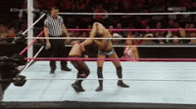 Two Women Wrestling In Ring With Referee GIF