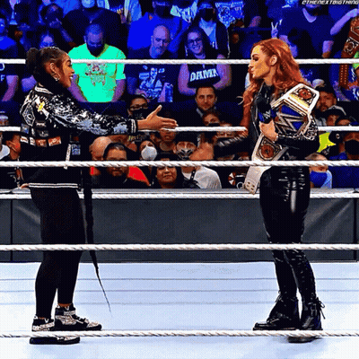 Two Women Wrestling One With Championship Belt GIF