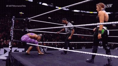 Two Women Wrestling With Referee In Ring GIF