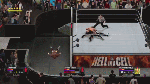Two Wrestlers Are Fighting In A Ring With A Banner That Says Hell In A Cell GIF