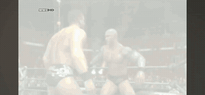 Two Wrestlers Are Fighting In A Ring With The Words Wwe Hd On The Bottom Left GIF