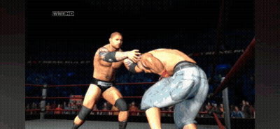 Two Wrestlers Are Fighting In A Ring With Wwe Hd On The Bottom Right GIF