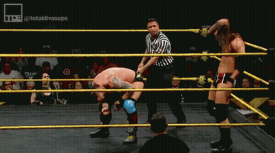 Two Wrestlers Are In A Ring With A Referee And The Hashtag Totaldivaseps GIF