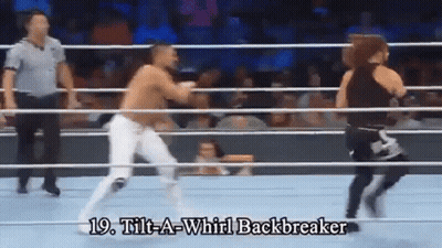 Two Wrestlers Are In A Ring With The Words Tilt-A-Whirl Backbreaker Written On The Bottom GIF