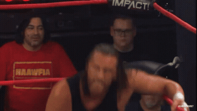 Two Wrestlers Fighting In Ring With YouTube Banner GIF