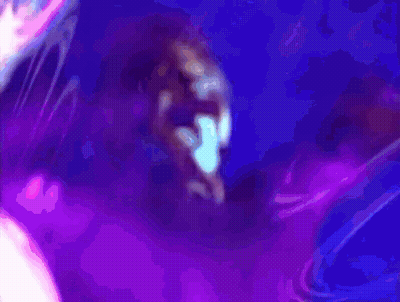Two Wrestlers Holding Championship Belts With Next Thing GIF