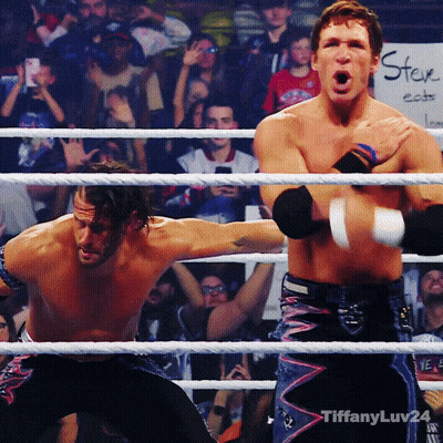 Two Wrestlers In A Ring With A Sign That Says ' Tiffanyluv24 ' On The Bottom GIF