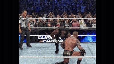 Two Wrestlers In A Ring With The Word Elimination On The Bottom GIF