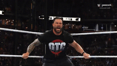 Two Wrestlers In A Ring With The Word Prime On The Ring GIF