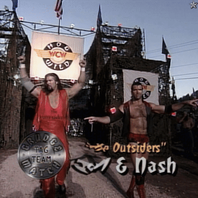 Two Wrestlers In Front Of WCW Wild Sign GIF