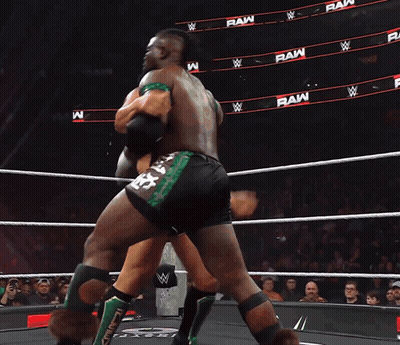 Two Wrestlers In Ring, Number 28 On Shorts GIF