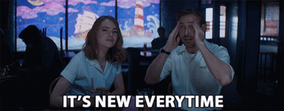 Two Wrestlers In Ring With American Nation Sign GIF