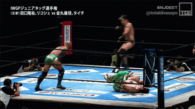 Two Wrestlers In Ring With Banco Sign GIF