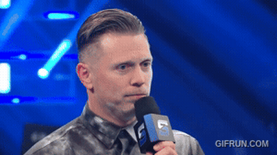 Two Wrestlers In Ring With Gifrun Watermark GIF