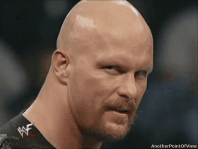 Two Wrestlers In Ring With Live Sign And Crowd GIF