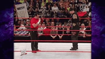 Two Wrestlers In Ring With Watt Sign GIF